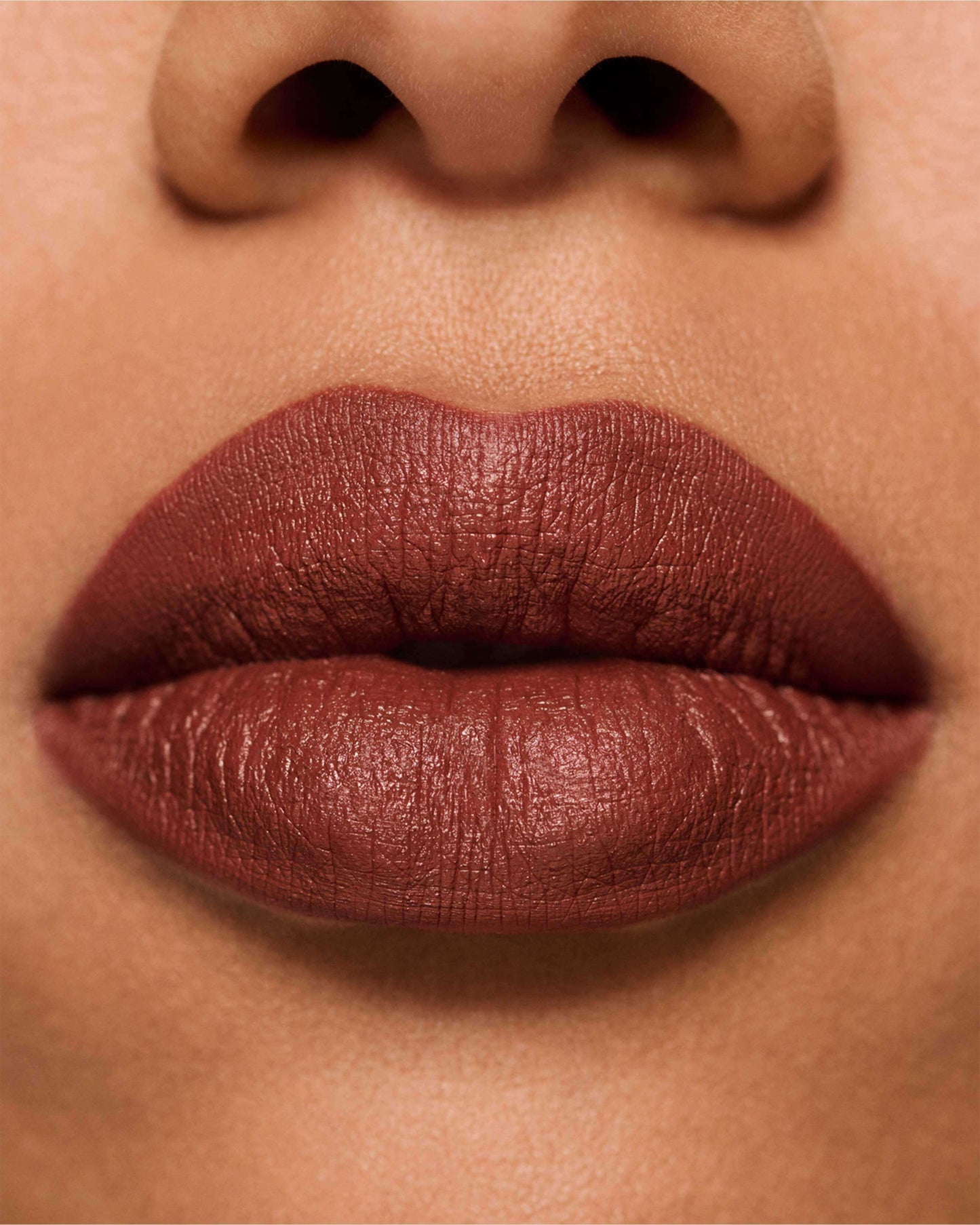 Rum (warm purplish brown made for medium skin tones in mind)